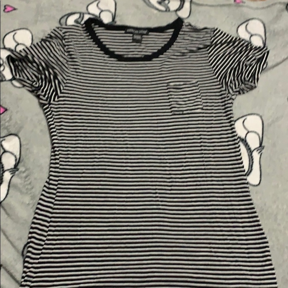 Black and White striped shirt.